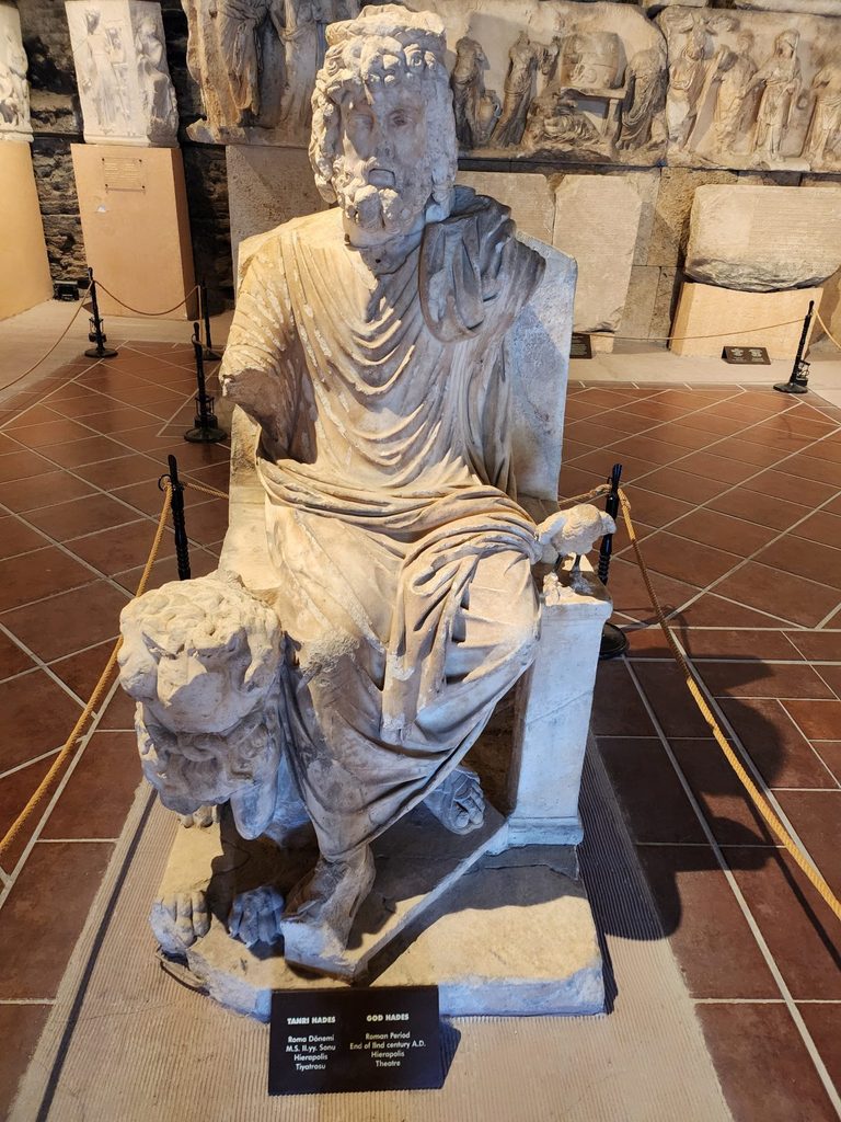 The absolute highlight of the museum: the authentic Statue of Hades enthroned with the three-headed dog Cerberus at his feet. It is the museum's centerpiece and an absolute must-see.