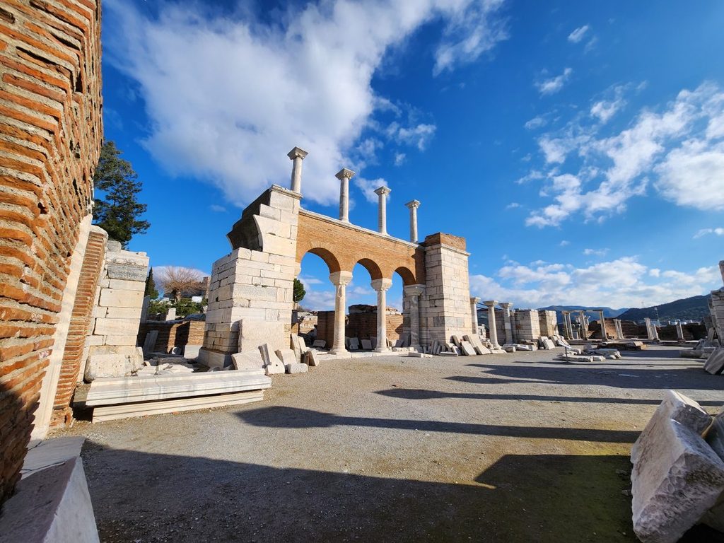 Colonnades and arches inside the Basilica of St. John. This is a key vantage point that offers a sense of the massive scale of the structure, originally built by Emperor Justinian of the Byzantine Empire in the 6th century.